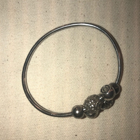 Silver Camilla flex bangle and two beads. - Picture 3 of 3